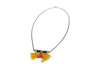 ISHI uses rough silk that’s dyed naturally with cochineal, indigo, nuts, moss, and the bark of a tree called Palo de Águila. Their Cajonos collection (shown here) features silk from two small villages in the northern Sierras in Oaxaca, where the Zapotec people grow the worm, make the thread, and dye it. They also use a waist loom to make rebozos, or shawls.