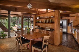 Liebermann built the dining table himself, which was inspired by Frank Lloyd Wright’s furniture. Jay told us that the original corners were so sharp, that his father rounded them out to make it work better for his large family—without losing the spirit of the table. It’s made with topical hardwood and is held together with epoxy joineries. 