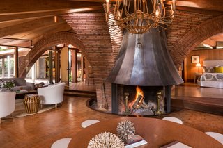 Liebermann had the steel fireplace fabricated off-site, which acts as the center of the house. Jay Little told us that he worked with many local businesses to get the work done on the house, some of which are still in business. 
