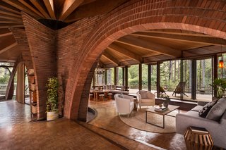 Liebermann and his wife Eva did the brickwork in the house—the most impressive section being the two arches that hover over the living areas and are surrounded by the home’s old-growth redwood structure. 