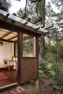 Jay and his father built a tiny office with red Dutch doors under the deck where they could escape from the constant action that occurs when you live with a large family.