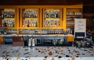 The public spaces of The Laylow in Waikiki are filled with both vintage furnishings and custom designs by OMFGCO. The Hideout bar features a Marmoreal countertop, which consists of an engineered marble developed in collaboration between Dzek and Max Lamb.