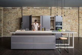 20 Best Modern Kitchen Counters - Photo 15 of 20 - This kitchen combines functionality and affordability with minimalism and clean lines. The solid wood and plywood are completed with MDF panels and come in two options: natural oiled or varnished. 