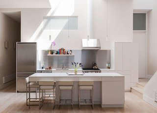 A 19th Century Firehouse Becomes a Three-Story Modern Home - Photo 1 of 8 -