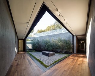 One of the last elements included was the interior courtyard, which was conceived as a solution to bring more light and nature to the private, underground program. The enclosed nature of this space provides a beautiful contrast to the open and expansive views above ground.