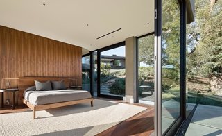 Walnut was used for the flooring on the lower bedroom level.