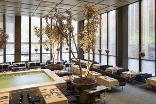 Featuring a bubbling water feature punctuated with seasonal trees, the International Style–designed Pool Room was home to many a power lunch over the years.