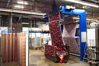 Once printed, fabrics are run through a mechanical dryer, which presses and sets all the layers of color in place. Marimekko's team then inspects and views each roll of textile by eye for any mistakes along process. Approved rolls are then shipped off to vendors and, in some cases, make their way onto any of the brand's myriad clothing items, products, or home accessories.