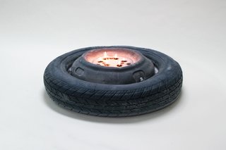 Alexander Heffesse's Construction Site scented candle recalls the warm glow of roadside fires. Light the wicks in this tire-shaped piece and be transported to the vacant lot of your dreams. 