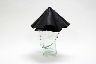The Leather Umbrella Hat by Yield Design promises to be your shelter in the storm. A hands-free rain solution made 100 percent from leather: What could go wrong? 