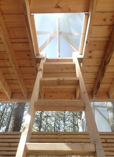 The students worked with a limited palette of materials: 2x framing material, galvanized connectors, translucent fiberglass, and supplies gathered on site.