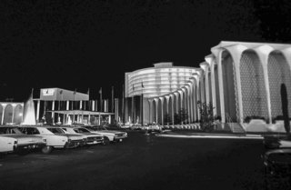 The valet and porte-cochère of Caesars Palace , 1966.