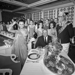 Caesars founder Jay Sarno enjoys a feast the the original Bacchanal restaurant, 1967.