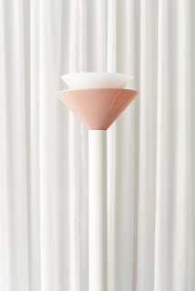 Elliott Meier created the custom floor lamps that line the space. 