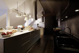 Inspired by the Sharing Economy, This Frankfurt Hotel Feels Just Like Home - Photo 2 of 7 - The fifth floor contains the Libertine's communal spaces, including the so-called "cooking landscape" kitchen.