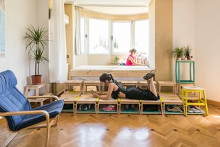 To create a temporary bedroom and study space for a PhD student, ENORME used simple components provided by IKEA. 