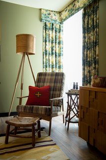 Hunting print draperies complement accessories and toys from the Camp Wandawega Land of Nod collaboration. 