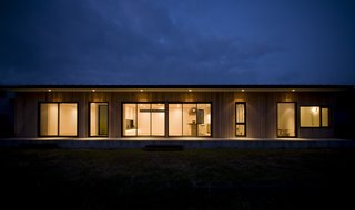 This Minimal Japanese Getaway Was Built for Surfing - Photo 7 of 7 - Vast expanses of windows connect the home to its site.