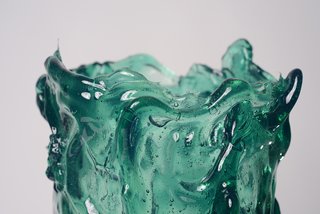 Pesce works with resin much in the way a glassblower works with his molten material. He molds the pieces and then manipulates the piece by hand as the material sets. The only difference: Pesce's creations are lightweight and virtually indestructible. 