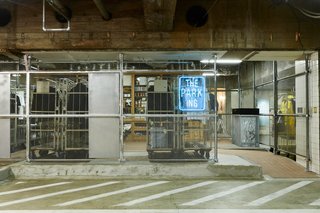 A Surprise Hides in this Tokyo Parking Garage - Photo 4 of 6 - About a dozen brand boutiques are represented within the select shop. The partitions between them call to mind construction materials, and were designed to be easily transformable.