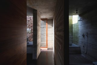Brick and board-formed concrete are the primary materials of the rugged, yet elegant, structure.