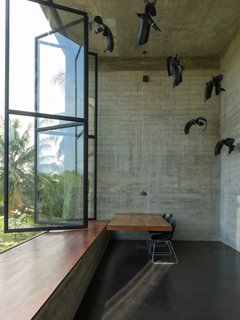 Among the most dramatic spaces is a double-height office off of the main studio space with sculptural installation that showcases its soaring ceiling.