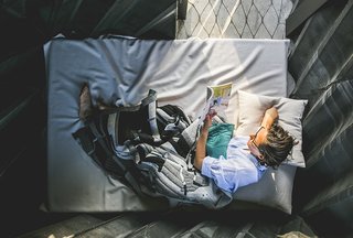 The structure has just enough space for a single bed, which folds into a couch when not in use.