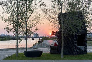 The Urban Cabin sits within a pocket park complete with poplar trees designed by Delva Landscape and Boomkwekerij Ebben.