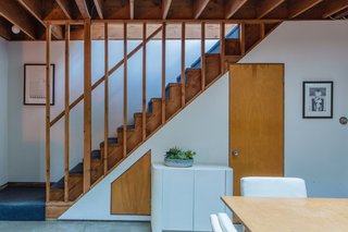 In contrast to architect Frank Gehry's iconic metal concert halls and museums, the Spiller House is delightfully simple. Here, the space is dominated by right angles and crisp geometry, unlike the undulating forms that define his later work. However the architect was already experimenting with subtle moves like the off-center placement of the home's central skylight.