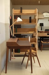 It's not unusual to find furniture from the line next to cardboard prototypes and woodworking tools—the team makes monthly sweeps to balance their desire to reveal their process without taking away from the polished pieces on display. 