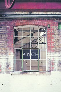 The exterior of the Pinch showroom and studio shows its industrial past.