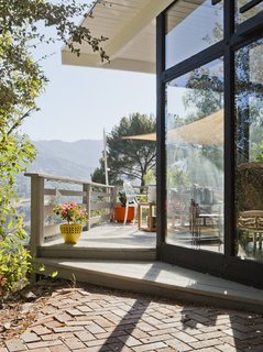 "Every single room in the house connects to the outside," Lara says. "Being New Yorkers who moved to California, feeling like we were living in the mountain was huge for us. Our deck really is an extension of the living room." 