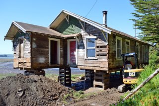 Curly's Cove:
One Man's Trash... - Photo 2 of 9 - Lifting the house
