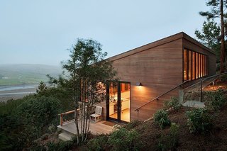 The View at This Art Studio Could Inspire a Masterpiece - Photo 1 of 3 - On a scenic one-acre site in Inverness, California, Richardson Architects planted an artist studio in a hillside overlooking a coastal vista. The client, a painter who lives on the property, requested the addition be situated downhill from the main residence to create distance between work and home. 
