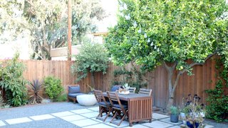 The interior was freshly renovated when the residents purchased the house in 2013; they redid the backyard themselves. The Bowl fire pit is by Potted.