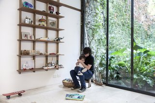 Will the Furniture Revolution Be Livestreamed? - Photo 2 of 4 - The wall-mounted Sticotti Bookshelf comes in a variety of sizes, and can be endlessly customized and expanded through an interlocking system. The retail prices will range from $290-840, depending on the size of the kit. 
