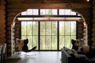 The home is enveloped in arctic nature. The surrounding woodland is interrupted only by outdoor recreation areas for golfing and skiing. 