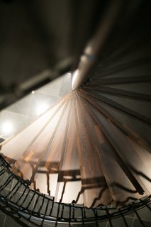 The dramatic spiral staircase was handmade by Voitto Mustakallio in Nurmijärvi, Finland.