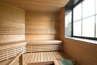 The home includes a traditional Finnish sauna clad in birch. 