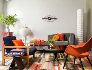 After Sandy, an NYC Designer Rehabs His Ruined Apartment—and Lends Neighbors a Hand with Theirs - Photo 4 of 4 - The living room includes two Noguchi lights, an Organic chair by Charles Eames and Eero Saarinen for Vitra, and a Nelson Eye clock. 