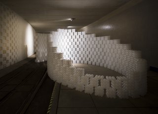 Through trial and error, the studio had to find the right hot glue to make the cubes durable. A glue best suited for compression from 3M was required for the units that made up the seating while a more standard hot glue was applied in general. 