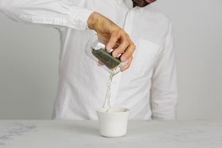 Once the tea is ready, the lid can be pulled back to pour, no strainer required. 