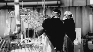 Making Bertoia - Photo 10 of 14 - Workers cleaning a Bertoia Bird Chair by hand. Photograph by Knoll.