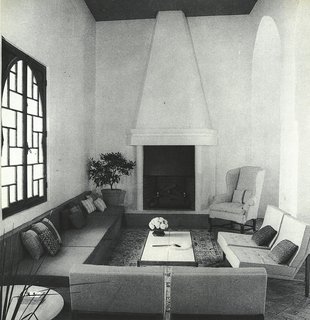 The main part of the 48-foot-long living room of York Castle, where Florence Knoll chairs were arranged around the fireplace. 