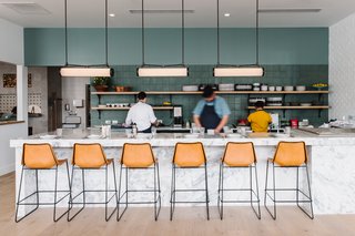 A Women-Run Restaurant in Nashville Invites Visitors to Just Have Fun - Photo 1 of 6 - Sullivan wanted to bring an oyster bar to Nashville that would have the same quality as any outpost in New York or Los Angeles. Ten to 15 oyster and shellfish varieties are on deck here, and they're served under vintage-inspired pendants from Southern Lights. 