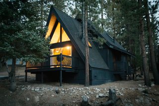 After: As part of the redesign, the exterior of the cabin was painted black. 