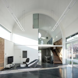 Thanks to expansive glass windows, natural light fills the space and provides an open, airy vibe.