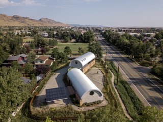 "The photovoltaic car port provides just enough electricity to run the geothermal pumps and compressor, as well as operate the buildings LED night lighting and all-electric kitchen," Moore describes.