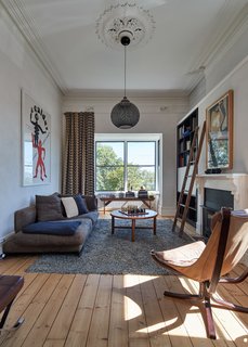 Natural light and wood features connect the existing living area to the addition. 