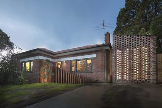 Dunin and her team repurposed recycled brick to match the original material on the exterior of the home. Brick was also used to build privacy walls that would still bring in light and air. 